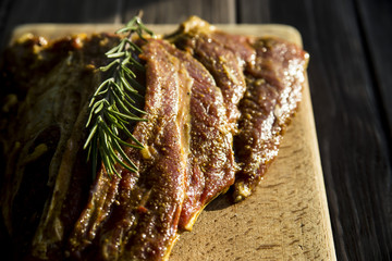 raw marinated lamb meat - with spices, turmeric, rosemary