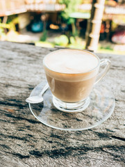 Coffee cup on wood table