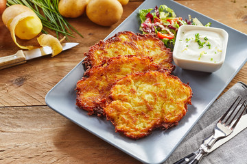 Crisp Fried Potato Rosti Served with Salad and Dip