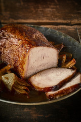 One carved meat roast with dark savory sauce