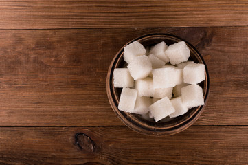 Diabetes. A lot of sugar cubes in jar