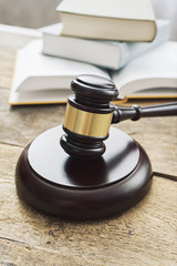 wooden judge hummer with books