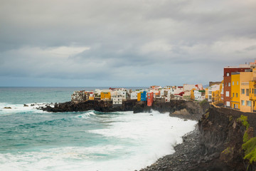 Fototapeta premium View of colourful houses of Punta Brava from beach in Puerto de la Cruz, Tenerife