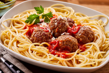 Saucy Homemade Meatballs on a Bed of Spaghetti