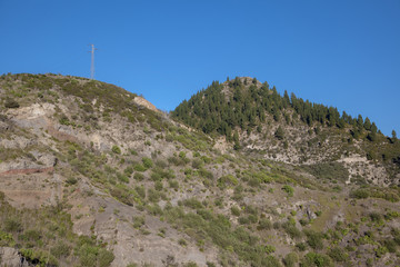 Fototapeta na wymiar big hills mountains and electrical line