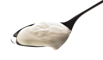 sour cream in a spoon