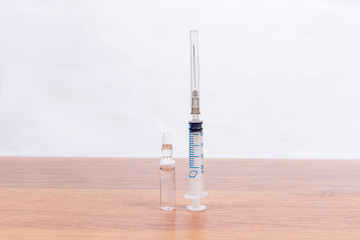 Cropped image of man taking pill out from blister pack at home