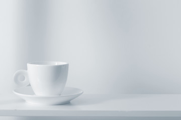 white cup on white background