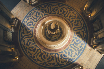 Top view from palace hall with a fountain in the center with the reflex of the sun light. Monserrate Place in Sintra Portugal