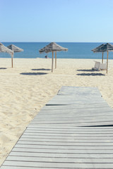 Wooden sandy beach boardwalk background closeup image