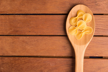 Farfalle into a spoon