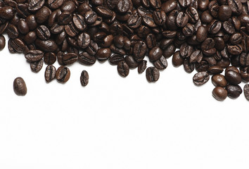 Background of several coffee beans on top of image on white background. Vertical shoot.