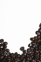 Background of coffee beans on white background. Vertical shoot.