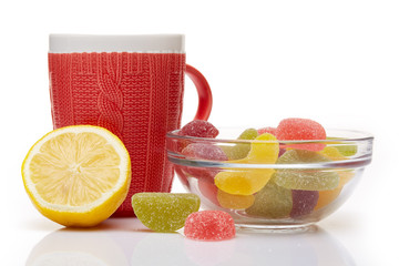 Fruit marmalade and tea with lemon.