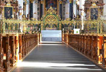 Fototapeta premium Rows of benches in a church
