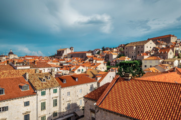Fototapeta premium Rooftops in Dubrovnik old town in Croatia on a sunny day with blue sky