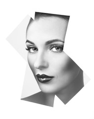 Girl with glamorous makeup looks through the geometric pattern in the paper