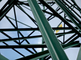 The metal structure of a pylon of the electric line.