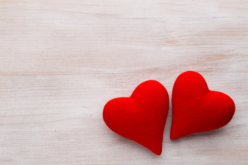 Fototapeta na wymiar Red hearts the gray background. Valentine Day background.