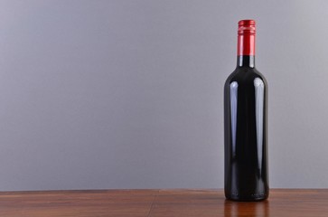 Fototapeta na wymiar Red wine bottle frontal
