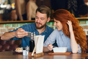Friends eating in restaurant