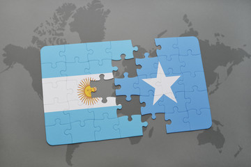 puzzle with the national flag of argentina and somalia on a world map