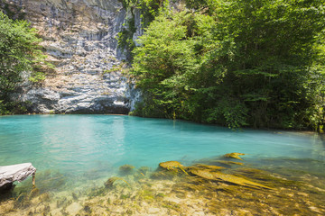 blue lake in mountains on the way to  Ritsa