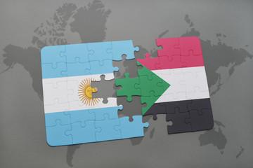 puzzle with the national flag of argentina and sudan on a world map
