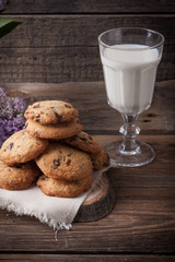 Obraz na płótnie Canvas Stack of cookies with glass of milk