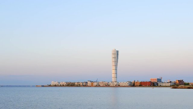 Turning Torso skyscraper building. Modern architecture apartment tower block by the sea