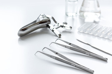 instruments of gynecologist on white background