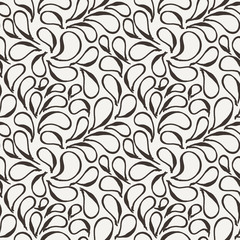 Vector seamless pattern of stylized leaves and petals