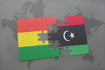 puzzle with the national flag of bolivia and libya on a world map