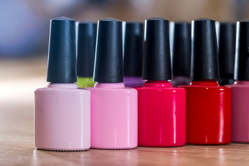 many Nail polish colorful on desk.