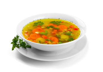 Fresh vegetable soup in plate on white background