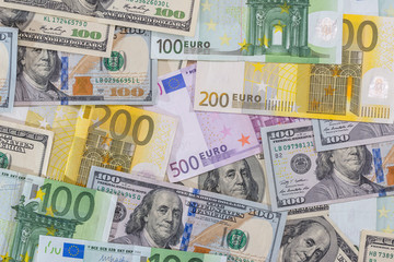 Fototapeta na wymiar many dollar and euro banknote as background.