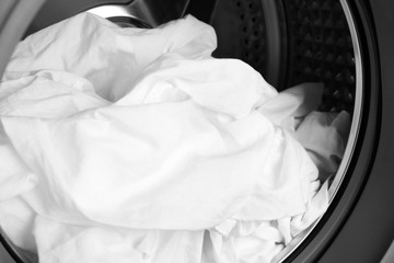 Washing machine and clothes, close up
