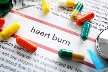 Phrase HEART BURN in center of medicines