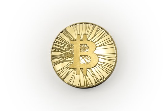 Single shiny gold Bitcoin coin on white background