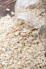 raw oatmeal is scattered on the table