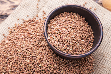 plate with raw buckwheat
