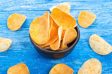 potato chips in a clay plate