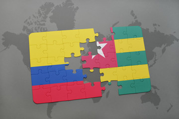 puzzle with the national flag of colombia and togo on a world map