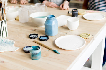 Obraz na płótnie Canvas workshop production of ceramic tableware product painting