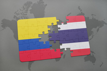 puzzle with the national flag of colombia and thailand on a world map