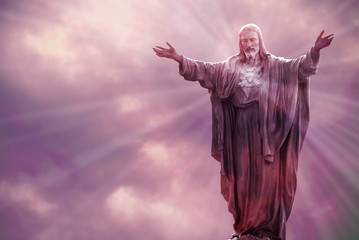 Jesus Christ statue against beautiful sky background - obrazy, fototapety, plakaty