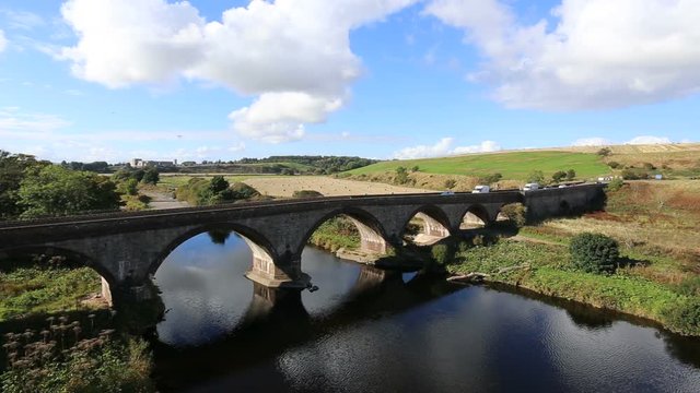 Vehicles on bridge over River North Esk Angus Scotland