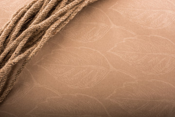 Bundle of linen rope  in brown background