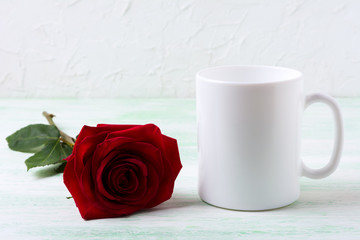 White coffee mug mockup with dark red rose