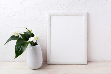 White frame mockup with euxaris flower in vase